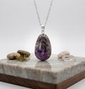 Anhänger getrommelter Amethyst gebändert 15 bis 30mm AA