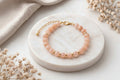 Armband Eira – Goldfarbene Ausführung und rosafarbener AA-Mondstein